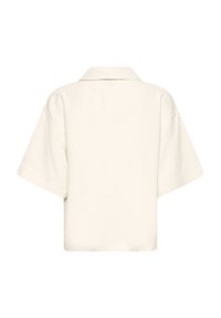 Off-white short-sleeve shirt with a classic collar and relaxed fit. Features a textured fabric and straight hemline at the back.