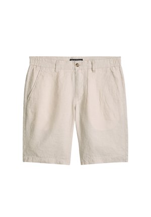 Shorts décontractés beige avec poches latérales, fermeture par boutons, passants pour ceinture et une partie élastique à l’arrière de la taille.