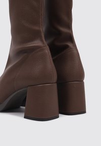 Sandra Fontán Platform ankle boots - brown