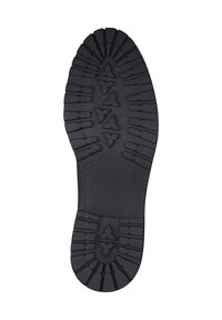 Suola di stivale in gomma nera con un motivo di battistrada profondo, caratterizzato da varie forme e scanalature per una migliore aderenza, contrassegnata con la taglia 42.