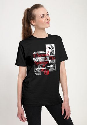Woman with ponytail wearing black Dungeons & Dragons T-shirt featuring comic panels, red dice, and text "I Survived The Spellplague."