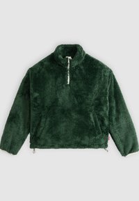 Σκούρο πράσινο φλις μπλουζάκι με μακριά μανίκια και φερμουάρ μέχρι τη μέση, με ψηλό γιακά και μπροστινές τσέπες, απεικονιζόμενο σε ανοιχτό γκρι φόντο.