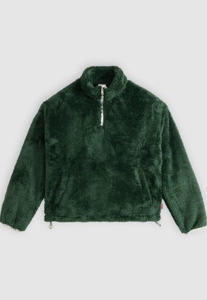 Tmavě zelený fleecový pulovr s dlouhými rukávy, půlzipem, vysokým límcem a předními kapsami, zobrazený na světle šedém pozadí.