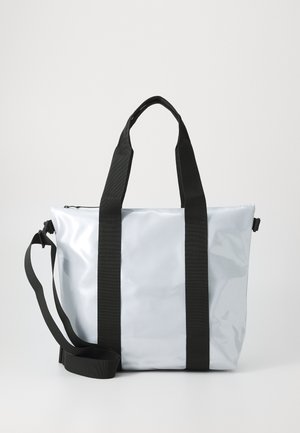 Tote bag made of glossy light gray material, featuring black straps and hardware. Includes a detachable black shoulder strap.