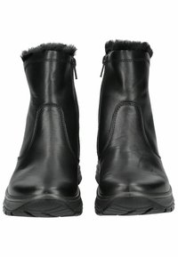 Botas de tobillo de cuero negro con cierre de cremallera, que cuentan con un suave forro de piel, punta redondeada y suela de goma texturizada para un mejor agarre.