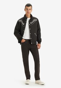 Levi's® 502™ brązowy