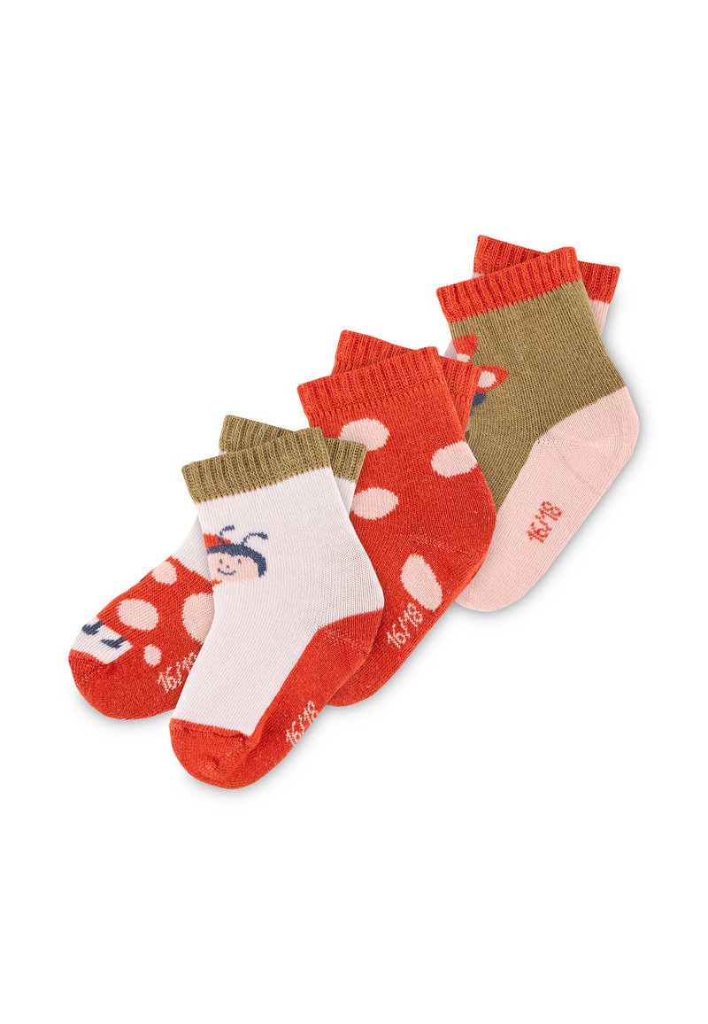 Three pairs of children's socks: colors include red, pink, and olive green; features patterns like polka dots and a character design on one pair.
