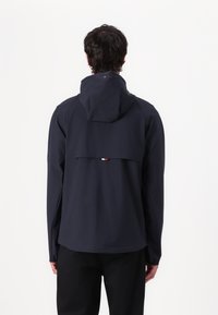 Tommy Hilfiger TECH HOODED JACKET - Chaqueta de entretiempo - desert sky