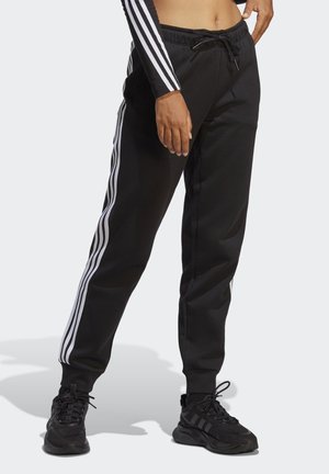 Pantaloni sportivi neri realizzati in tessuto morbido, con bande laterali bianche, vita elasticizzata con cordino e design a gamba affusolata.