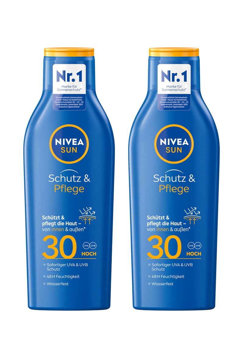 Two blue NIVEA Sun sunscreen bottles, with yellow lids, labeled SPF 30. Text highlights UVA/UVB protection and moisturizing features.