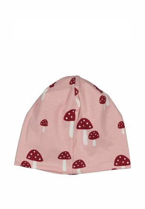 Mjuk rosa mössa med ett mönster av röda och vita prickiga svampar utspridda över tyget.