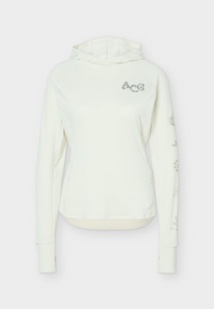 Witte hoodie met lange mouwen en duimgaten, klein "ACG" logo op de borst en subtiele bloemmotieven op de rechtermouw tegen een effen achtergrond.