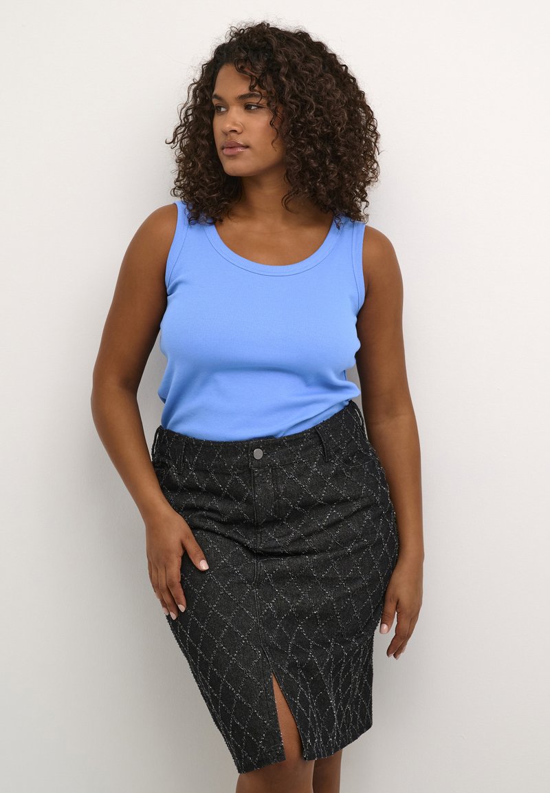 Blue sleeveless top and black pencil skirt with diamond pattern. Skirt features a front slit and button closure. Smooth, stretchy fabric.
