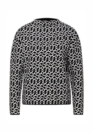 Suéter de punto con patrón geométrico en blanco y negro, escote redondo y mangas largas. La tela tiene una textura suave con un diseño estructurado.