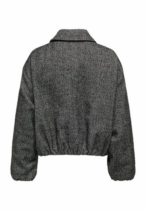 Veste cropped en chevrons noir et gris avec un large col, une taille élastique et des manches longues bouffantes. Tissu texturé avec une finition lisse.