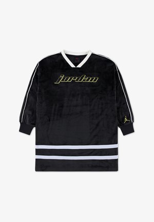 Must musta pikkade varrukatega särk mustast veluurist, millel on valged detailid, roheline "jordan" logo, V-kaeluse disain ning tikitud Jumpmani logo varrukal.