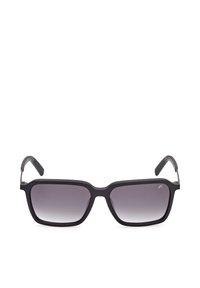 Lunettes de soleil rectangulaires noires avec des verres dégradés gris foncé et des embouts de branches en caoutchouc pour une meilleure adhérence.