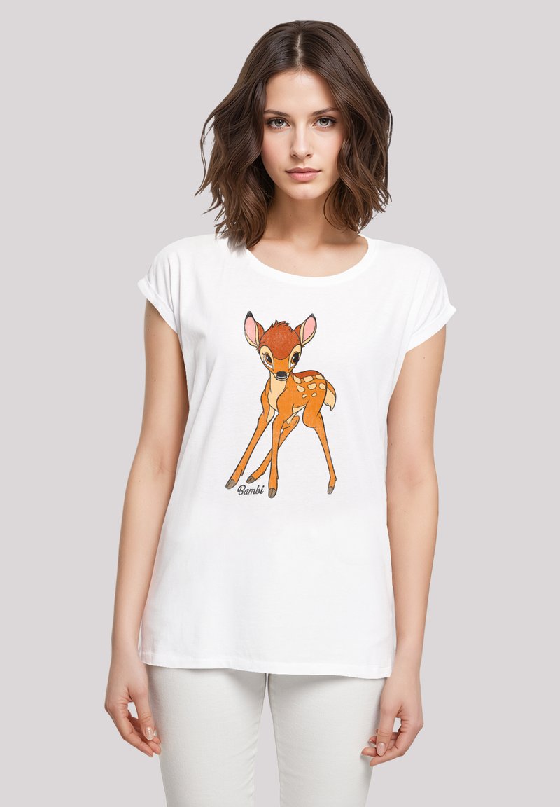 White cotton T-shirt featuring a graphic of a brown fawn with white spots. Short sleeves and a round neckline. "Bambi" text at the bottom.