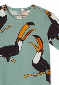 Body a maniche lunghe verde menta con grandi stampe di tucano colorate. Realizzato in morbido cotone, con chiusure a scatto sulla spalla per un facile vestire.