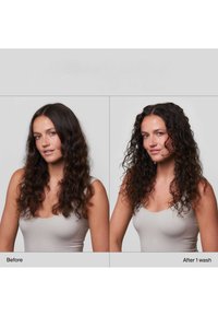 Two side-by-side portraits of a woman with long, dark, wavy hair. Left shows frizz; right shows smoother, defined curls. Light grey background.