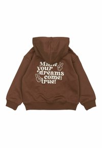 Bruine hoodie met een kangoeroezak, met op de achterkant witte tekst "Maak je dromen waar!" en vredes teken grafieken.