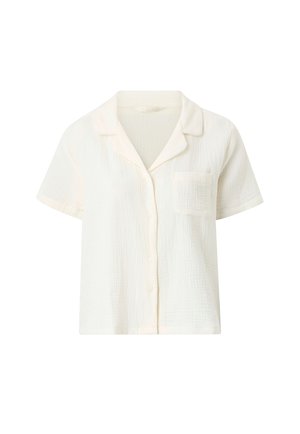 Short-sleeve, button-up shirt in lightweight, textured white fabric with a chest pocket and soft collar. Casual fit with subtle detailing.