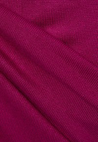 Magenta ribbed fabric with a smooth texture, showing diagonal folds and varying light reflections, suitable for apparel or accessories.
