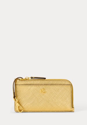 Kullast tekstuuriga nahast lukkrahakott eemaldatava randmerihma ja väikese metallist RL logoga esiküljel, valgel taustal.