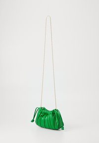 Green leather pouch bag with a gathered design, gold chain strap, and drawstring closure, featuring a smooth, shiny texture.