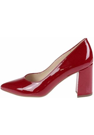 Escarpin en cuir verni rouge avec bout pointu et talon épais de hauteur moyenne, doublure intérieure beige.