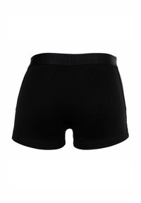 Schwarze Baumwollshorts mit glatter Textur, elastischem Bund und Oberschenkel-langer Länge, die ein einfaches Design ohne Verzierung aufweisen.