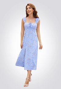 Vestido midi azul con flores, con hombros con volantes, escote cuadrado y una abertura frontal. Hecho de una tela ligera, presenta un delicado patrón de flores.