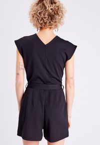 Cache Cache MIT GÜRTEL - Jumpsuit - noir