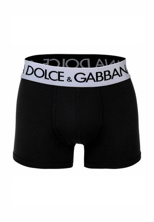 Boxer shorts en coton noir avec une ceinture grise portant "DOLCE & GABBANA" en lettres noires en gras. Texture douce, design ajusté.
