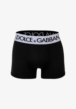 Zwarte katoenen boxershorts met een grijze tailleband waarop "DOLCE & GABBANA" in vetgedrukte zwarte letters staat. Zachte textuur, slim fit ontwerp.