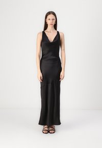Black satin evening dress with a deep V-neck, sleeveless design, and a flowing silhouette. Features a subtle curved seam detail.