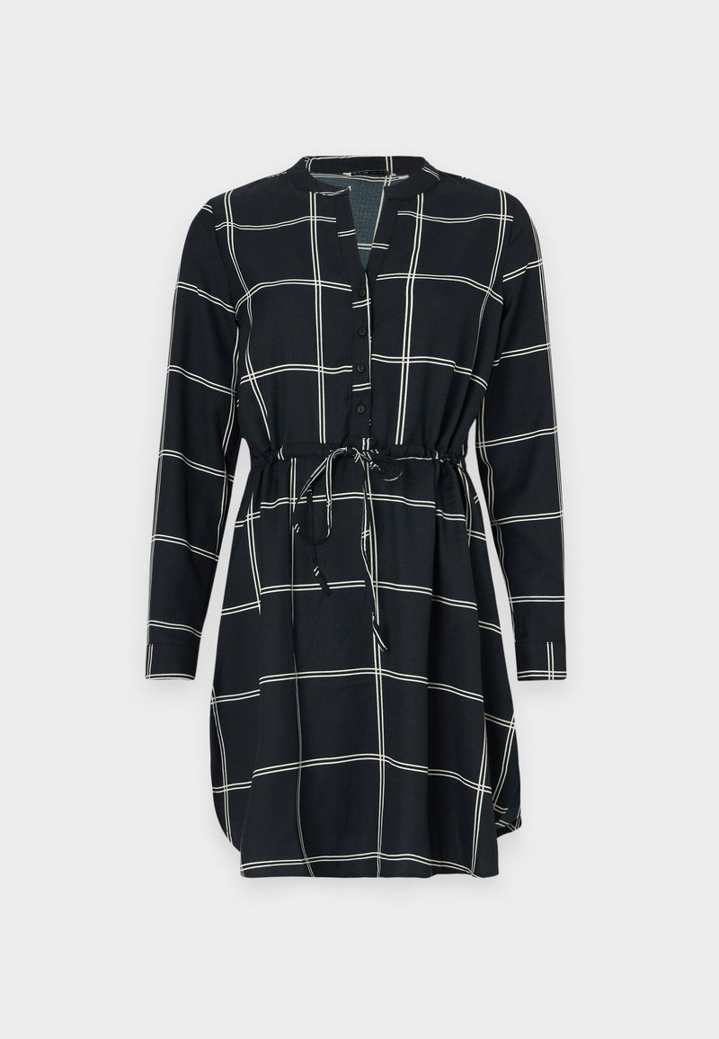 Schwarzes Kleid mit einem weißen Karomuster, langen Ärmeln, einer geknöpften Front und einer taillierten Taille für einen verstellbaren Sitz. Glatte Stofftextur.