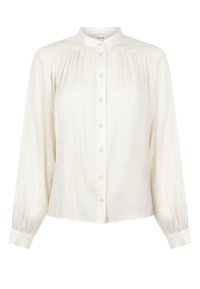 White long-sleeve blouse with a mandarin collar, button front, elasticized cuffs, and subtle vertical ribbing texture.