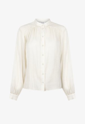 Witte blouse met lange mouwen en een Mandarin-kraag, knoopsluiting aan de voorkant, elastische manchetten en subtiele verticale ribbeltextuur.