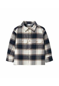 Flannel shirt featuring a navy and cream plaid pattern, button-up front, and two chest pockets with gold buttons. Long sleeves.