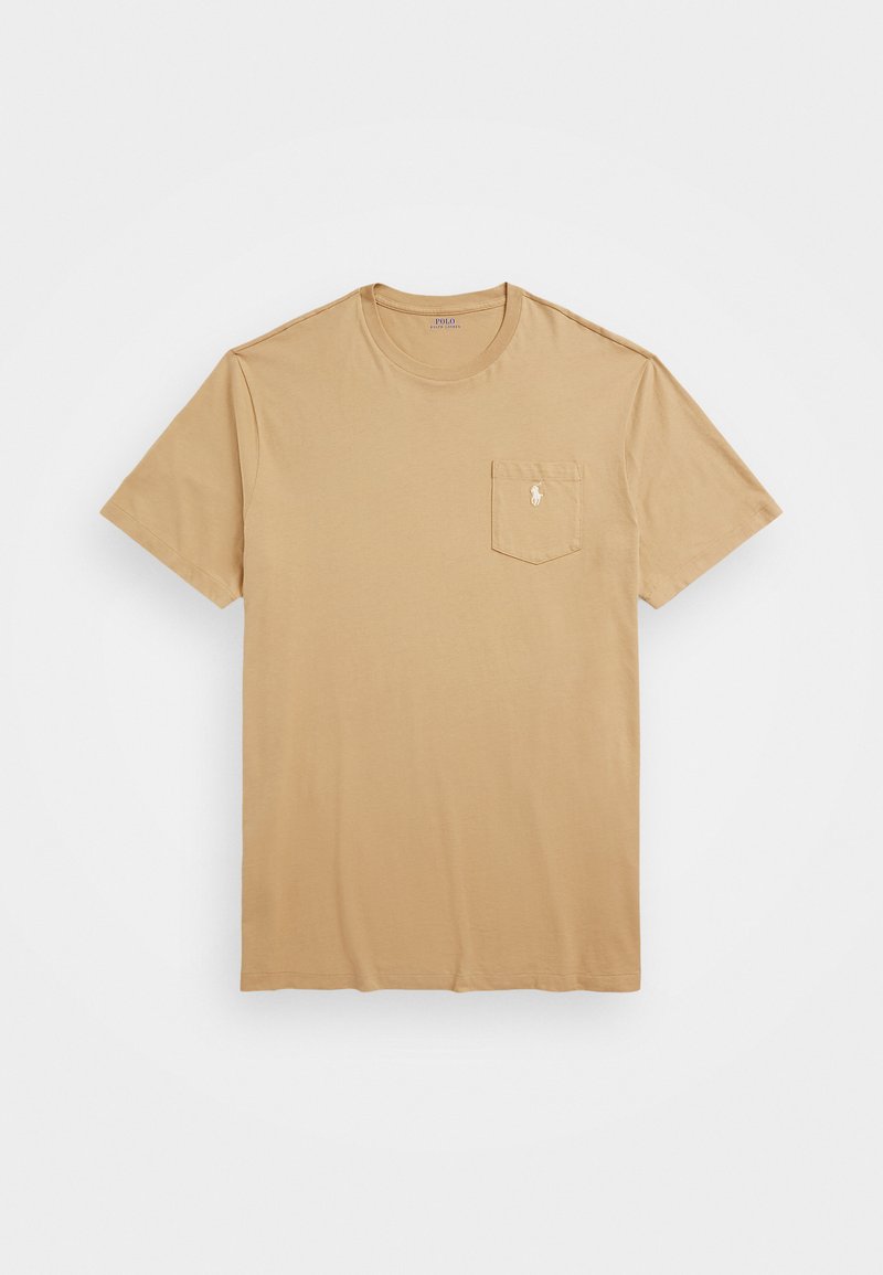 T-shirt beige à manches courtes en coton avec un col rond, doté d'une poche sur la poitrine gauche et d'un logo brodé sur la poche.