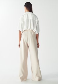 WILLA CROWN PANTS - Trousers - ecru