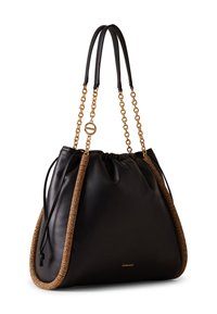 Black leather drawstring bag with braided tan accents, featuring gold chain straps and a round logo hardware detail.