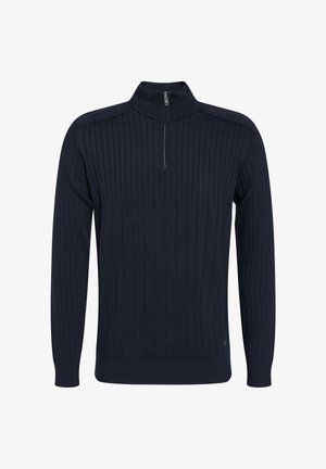 Mornarsko pulover s četrt zadrgo, značilen po rebrasti strukturi, dolgih rokavih in prilegajočem se dizajnu. Narejen iz mehkega pletenega materiala.