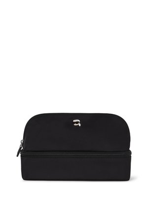 Black zippered pouch with a rounded top, made of durable fabric. Features a smooth texture and a small silver accent logo on the front.