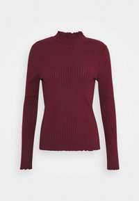 Burgunderfarbener, gerippter Rollkragenpullover mit langen Ärmeln, ausgestattet mit einem Rüschenkragen und strukturiertem Stoff. Eng anliegendes Design mit verkürztem Saum.