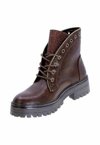 Stivaletto alla caviglia in pelle marrone con suola robusta, dotato di zip frontale e dettagli borchiati marroni sul risvolto. Design con lacci.