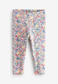 Leggings floreali con una texture a coste presentano uno sfondo giallo brillante decorato con fiori multicolori e foglie verdi.