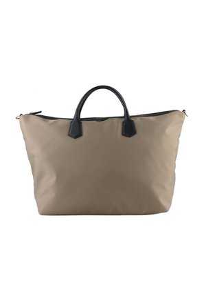 Grand sac fourre-tout beige avec poignées noires et fermeture éclair en haut, présenté sur fond blanc.