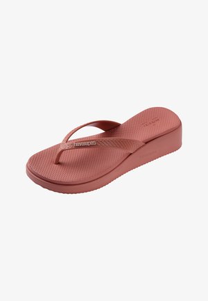 Infradito con zeppa singola rosa polveroso, con suola testurizzata e logo "havaianas" sulla cinghia e sul lato.